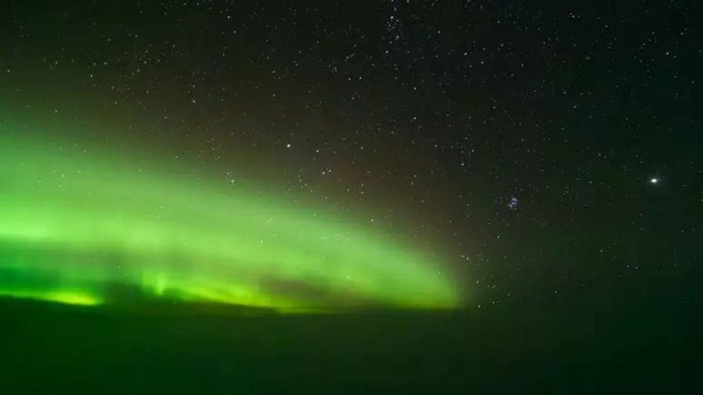 Airplane pilots record the northern lights during a flight to Lisbon, Portugal